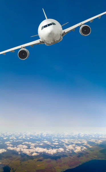 White, passenger airliner fly in sky — Stock Photo, Image