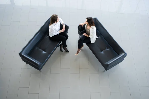 Top view of Two Businesswomen Meeting In Reception of Modern Office. — стокове фото