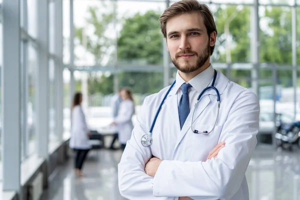 Happy male medical doctor portrait in hospital. — Stock Photo, Image