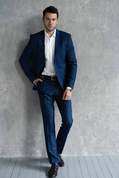 Full length of handsome man wear blue suit isolated on grey background. — Stock Photo, Image