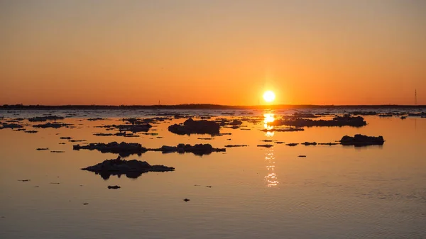 Ice drift on sunset. . Beautiful ice motion evening landscape — Stock Image Ice drift on sunset. . Beautiful ice motion evening landscape Stock Image