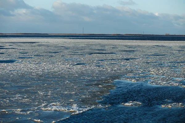 Northern Dvina river freezing in sunny winter day. Ice formation. Sugar — Stock Image Northern Dvina river freezing in sunny winter day. Ice formation. Sugar Royalty Free Stock Photos