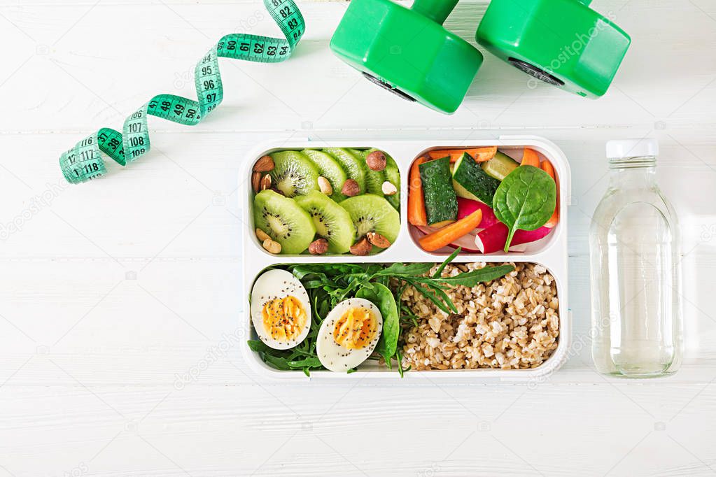 top view of concept healthy food and sports lifestyle, vegetarian lunch in lunchbox