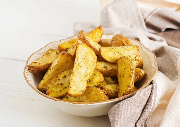 Ruddy Baked Potato Wedges Garlic White Background — Stock Photo, Image