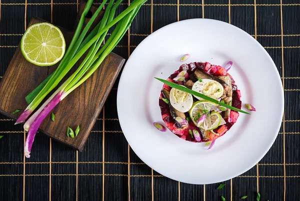 Salad with sprats, beets, potatoes and quail eggs — Stock Image Salad Sprats Beets Potatoes Quail Eggs Stock Image