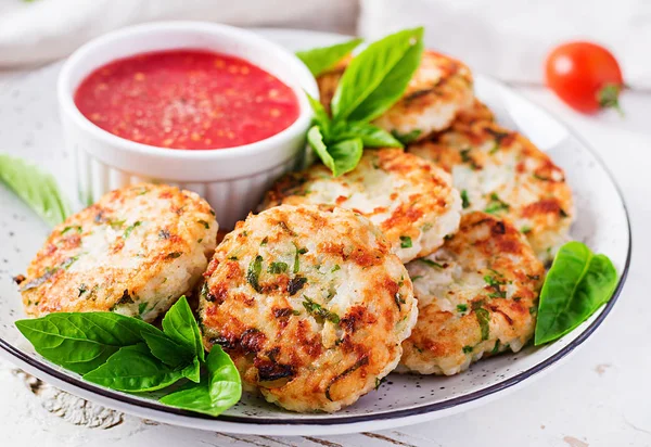 Delicious rice and chicken meat patties with garlic tomato sauce — Stock Photo, Image