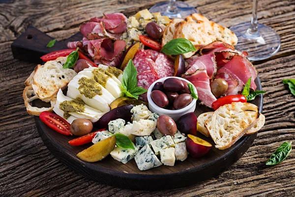 Antipasto Platter Ham Prosciutto Salami Blue Cheese Mozzarella Pesto Olives — Stock Photo, Image