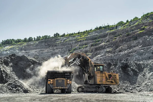 Mining of iron ore in a huge quarry