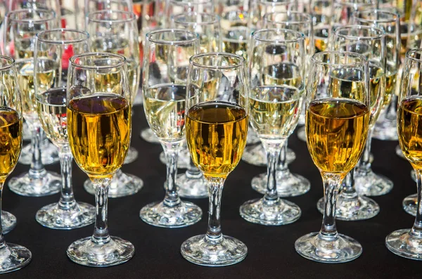 Glasses with champagne on a buffet table