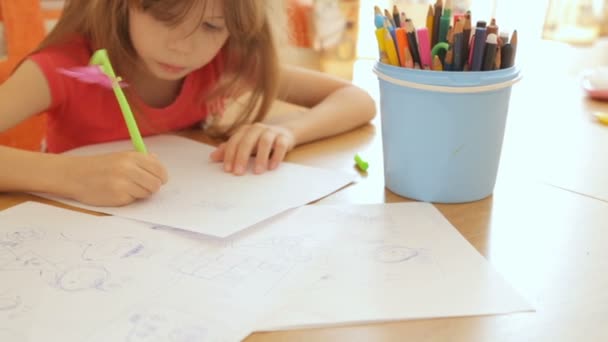 Little Girl Drawing Pictures Paper — Stock Video