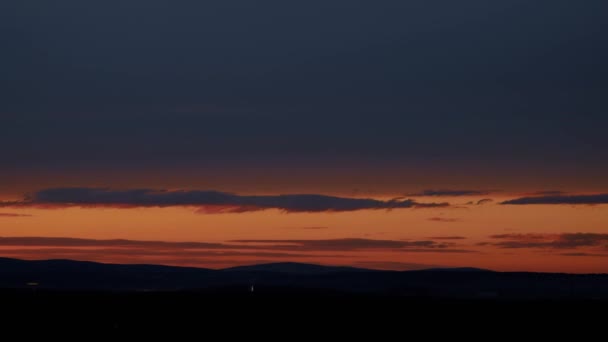Ciel coloré au coucher du soleil. Temps écoulé