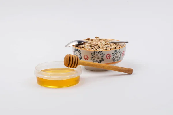 Eine Keramikschale Voller Haferflocken Und Ein Gefäß Mit Honig Einem — Stockfoto