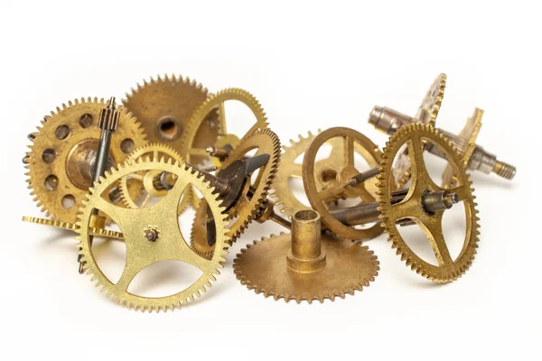 copper golden different little gears isolated on white background