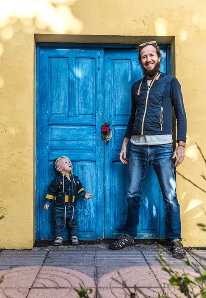 Father Baby Son Standing Blue Door Way — Stock Photo, Image
