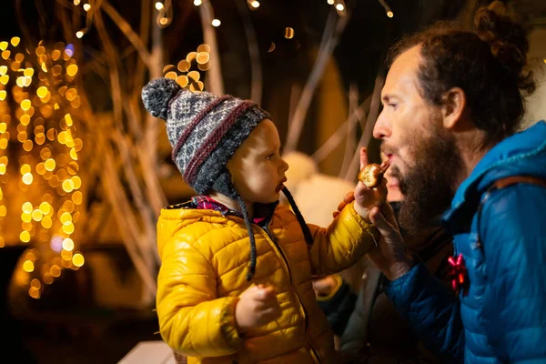 Son Offering Father Traditional Food Christmas Market Zagreb Croatia — Stock Photo, Image