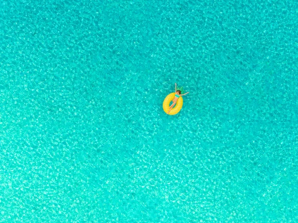 Aerial View Girl Floating Inflatable Pineapple Mattress Transparent Sea — Stock Photo, Image