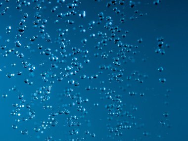 Mavi su bokeh damlaları