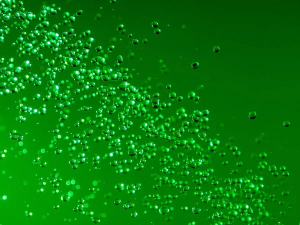 green water drops bokeh