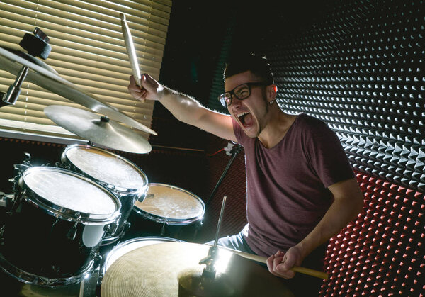 Drummer in recording studio
