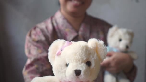 Asian Lady Smile Gives Teddy Pink Cloth You Other Her — Stock Video