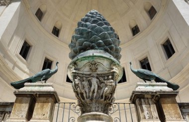 Pinecone Fountain in the wall of the Pigna Courtyard, located in Vatican City clipart