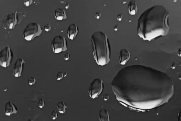 Water drops over glass surface — Stock Photo, Image