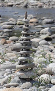 river stones pile along Sesia River Piedmont, Italy clipart
