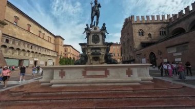 BOLOGNA, ITALY - SEPTEMBER 9, 2025: Neptune Fountain Statue in Piazza Maggiore square