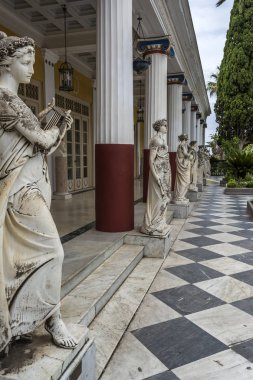 Achilleion palace, Corfu, Greece - August 24, 2018: Statues of the nine muses at Achilleion Palace, island of Corfu. Achilleion was built by Empress Elisabeth of Austria, known as Sissi. clipart