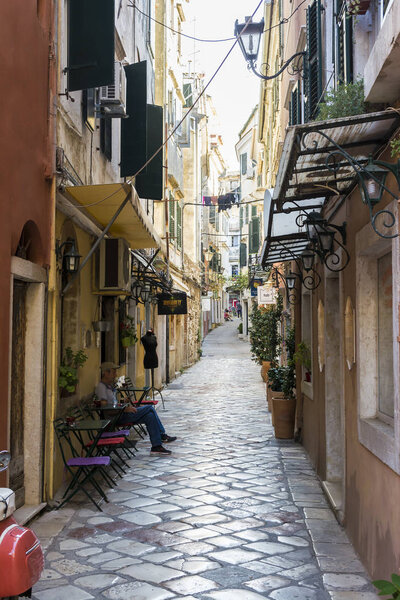 Corfu island, Greece - August 25, 2018: Alleyway in Corfu old town - Greece