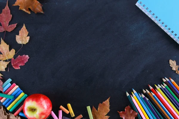 Colored Pencils Notebook Crayons Red Apple Fall Leaves Blackboard Top — Stock Photo, Image