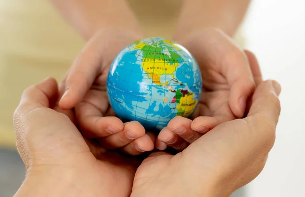 Close Photo Mother Child Holding Hands World Globe Hands Better — Stock Photo, Image