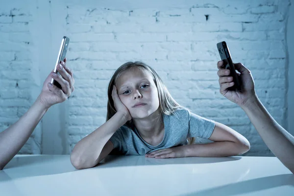 Mother Father Using Mobile Phones Neglecting Little Sad Ignored Daughter — Stock Photo, Image