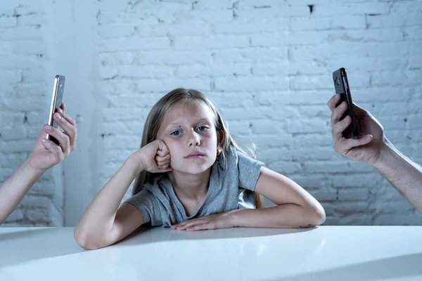 Mother Father Using Mobile Phones Neglecting Little Sad Ignored Daughter — Stock Photo, Image