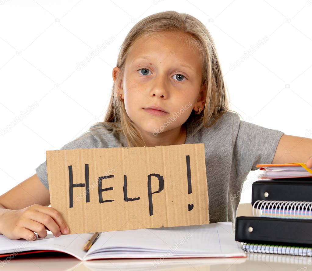 cute little school girl holding help sign in stress with books and homework. children education concept isolated on white background
