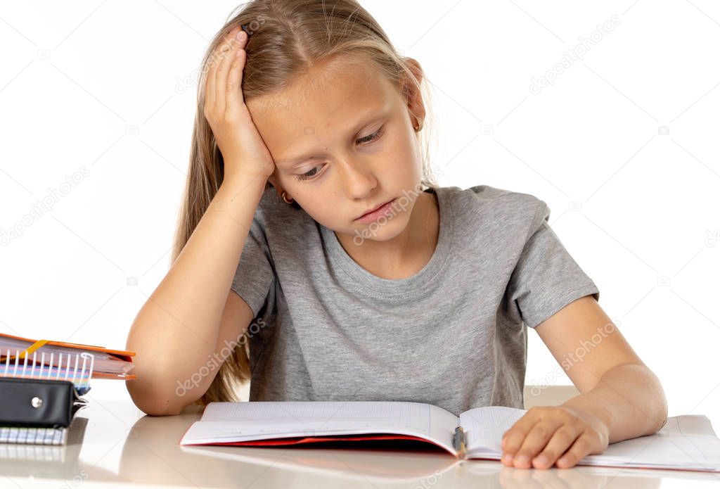 education, elementary school, childhood and emotions concept.  sad or bored little student girl studying looking frustrated with learning problems on white background