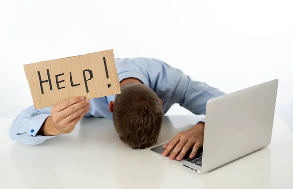 Businessman on laptop and help sign — Stock Photo, Image