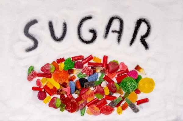 Mix of candies and written word sugar