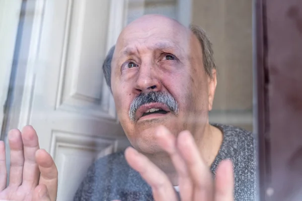Old Senior Man Looking Throughout Window Feeling Confused Depressed Alone — Stock Photo, Image