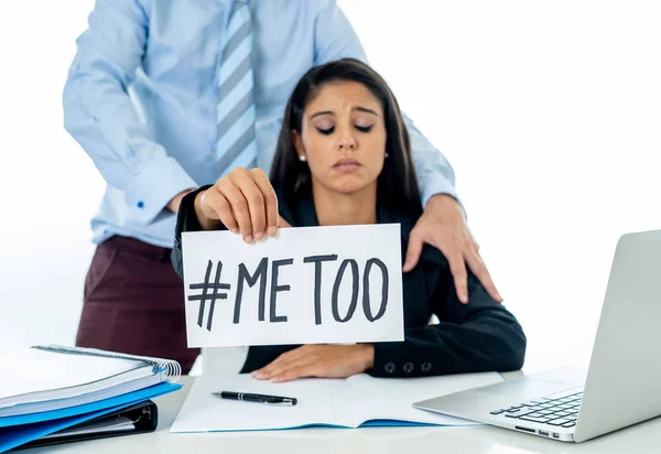 Me Too Harassment Campaign. Young businesswoman being sexually harass by her boss in the office holding a note with the text me too in stop sexual abuse women human rights concept.