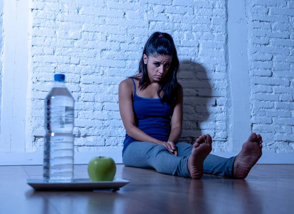 Desperate Dieting Young Woman Sitting Ground Looking Sad One Apple — Stock Photo, Image