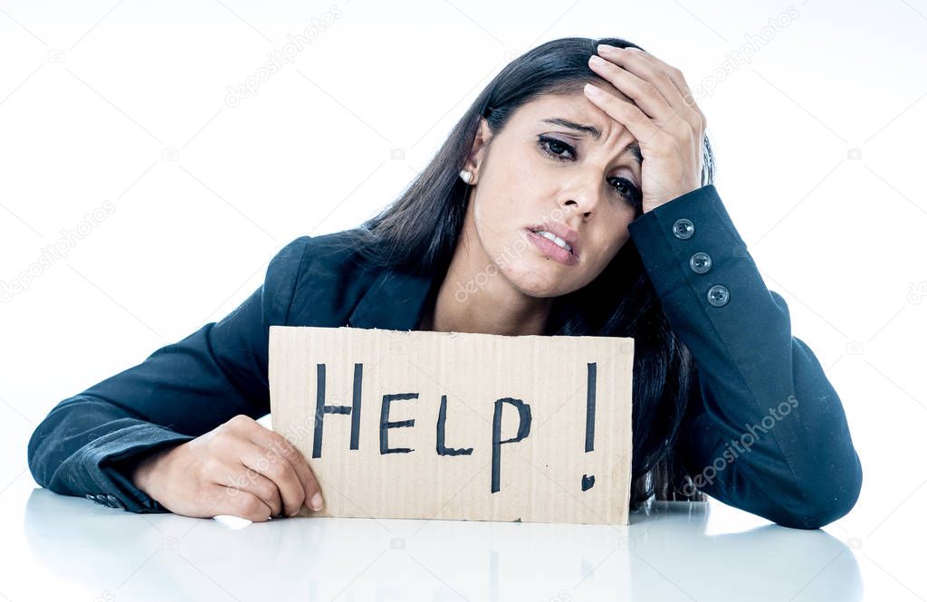 Young beautiful latin business woman overwhelmed and tired holding a help sign. looking Stressed, bored, frustrated, upset and unhappy at work. business frustration concept