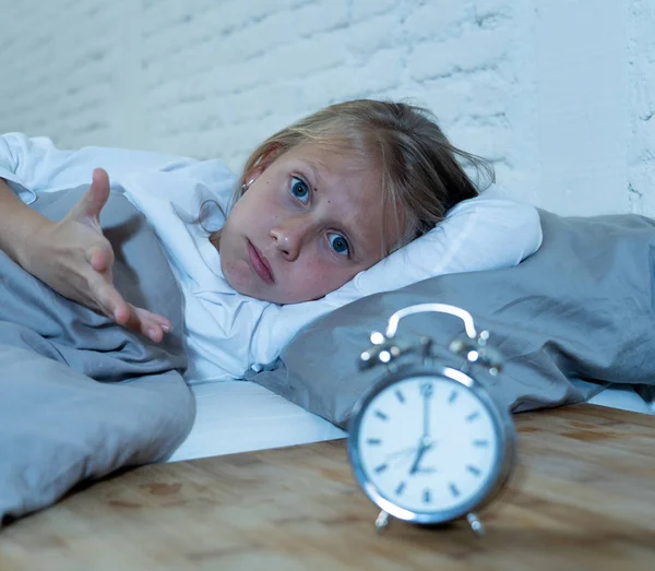 Sweet Sleepless Little Girl Lying Sad Bed Looking Alarm Clock — Stock Photo, Image