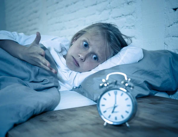 Sweet Sleepless Little Girl Lying Sad Bed Looking Alarm Clock — Stock Photo, Image