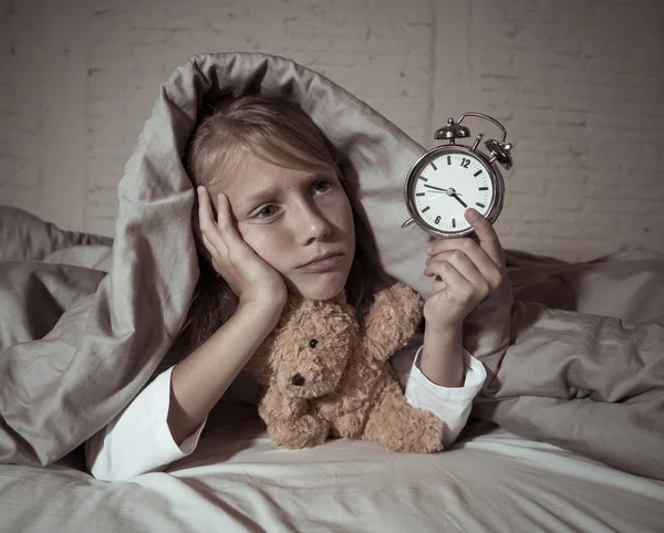 Cute Sleepless Little Girl Lying Bed Showing Alarm Clock Looking — Stock Photo, Image