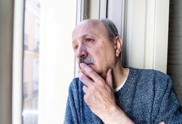 Old Senior Man Looking Throughout Window Feeling Confused Depressed Alone — Stock Photo, Image