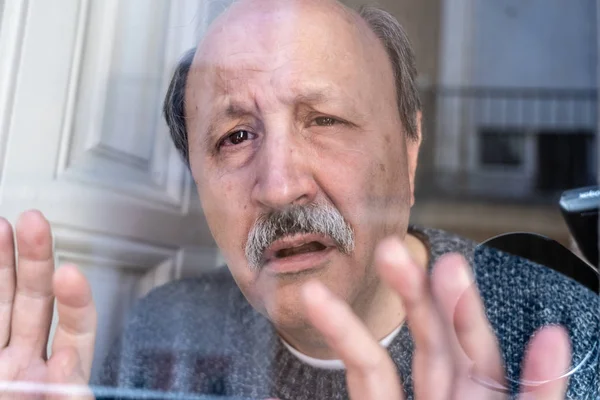 Old Senior Man Looking Throughout Window Feeling Confused Depressed Alone — Stock Photo, Image