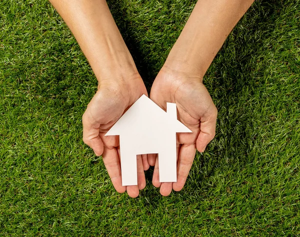 Conceptual Picture Woman Hands Holding White House Green Grass Field — Stock Photo, Image