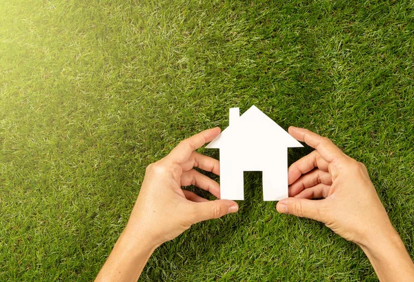 Conceptual Picture Woman Hands Holding White House Green Grass Field — Stock Photo, Image