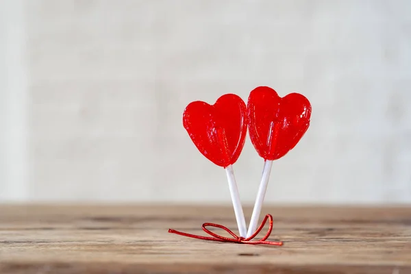 Two Cute Red Heart Shaped Lollipops Rustic Wooden Table Beautiful — Stock Photo, Image